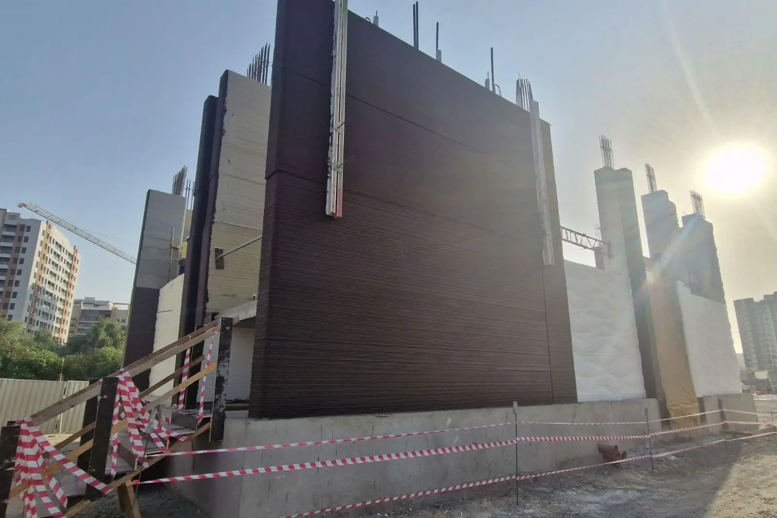 Printed wall panels in place during construction